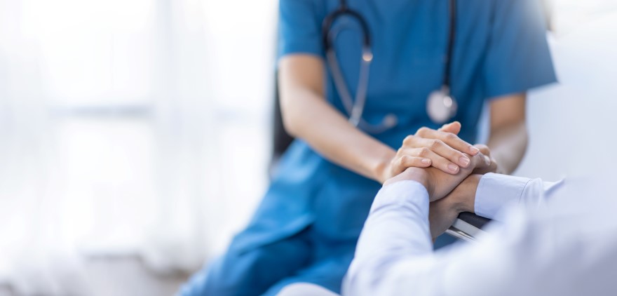 Medical professional treats injured employee.