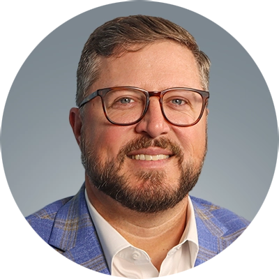 Headshot of David Tucker.