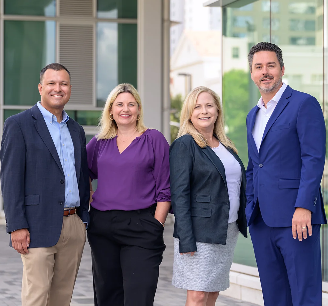 A group of Summit employees with LRA Insurance President, James Lumbra.